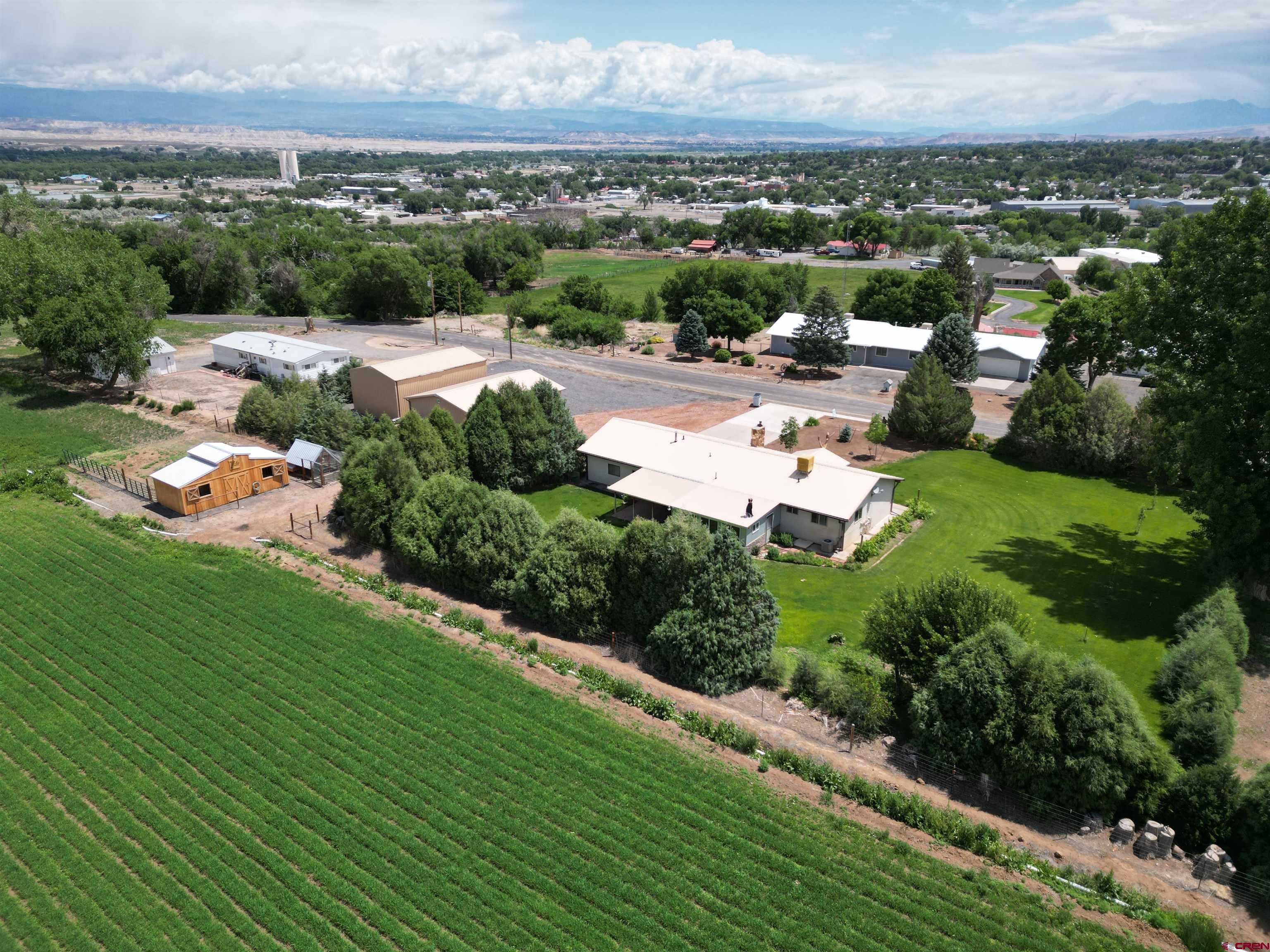 14894 Deer Run Road Delta, CO 81416 - Photo 34 of 40 an aerial view of a town with residential houses