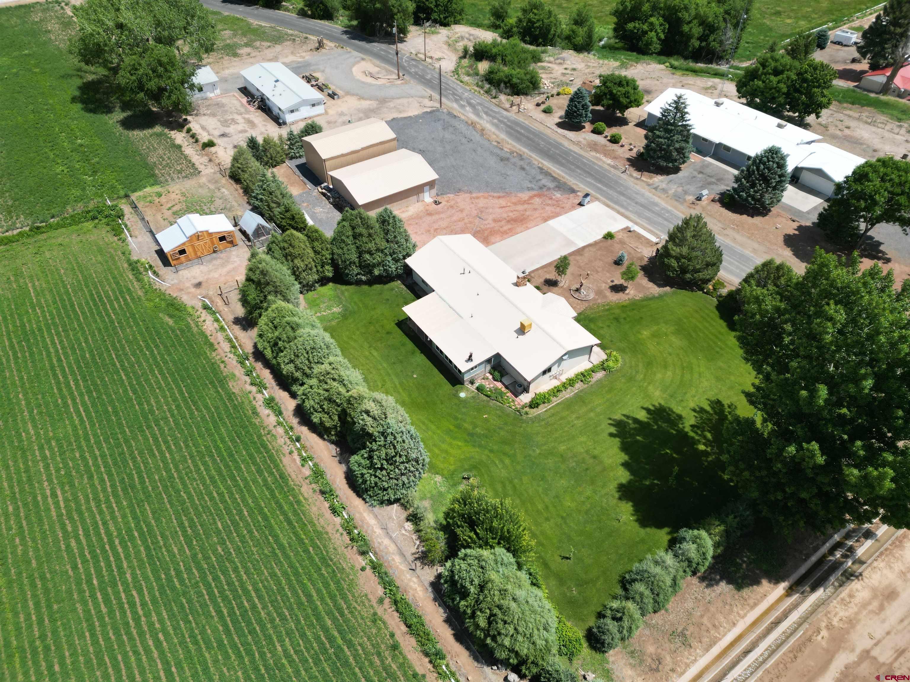 14894 Deer Run Road Delta, CO 81416 - Photo 36 of 40 an aerial view of residential houses with outdoor space