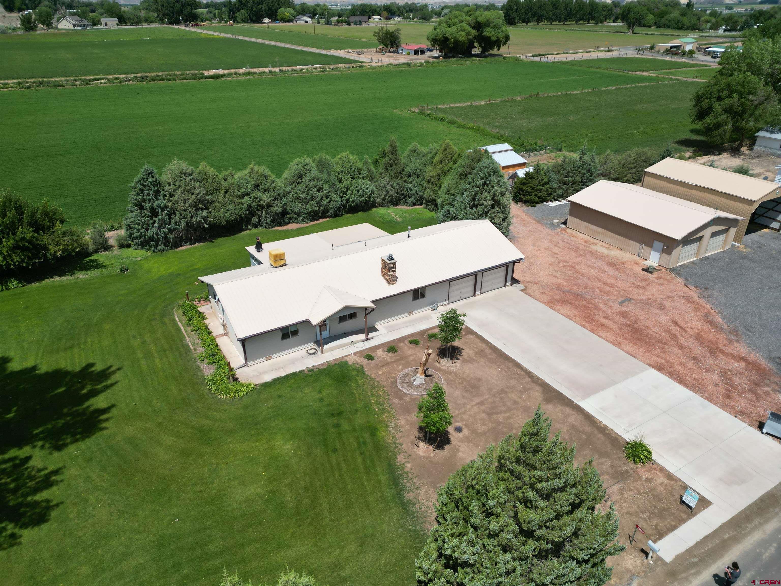 14894 Deer Run Road Delta, CO 81416 - Photo 38 of 40 a garden view with a sitting space