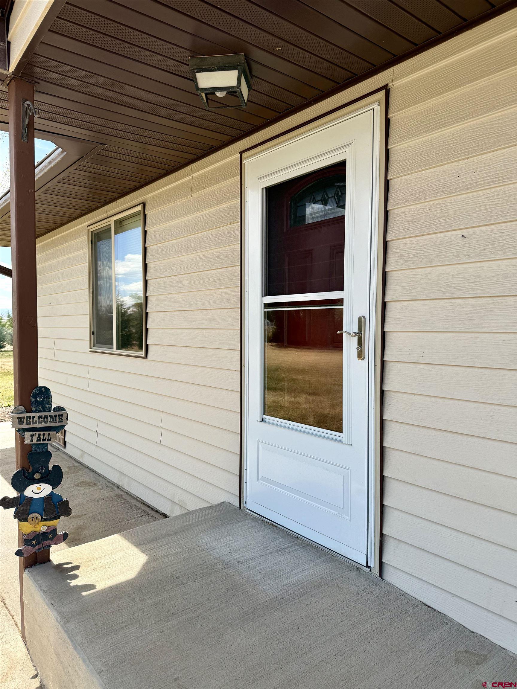 14894 Deer Run Road Delta, CO 81416 - Photo 4 of 40 a view of backyard with cabin