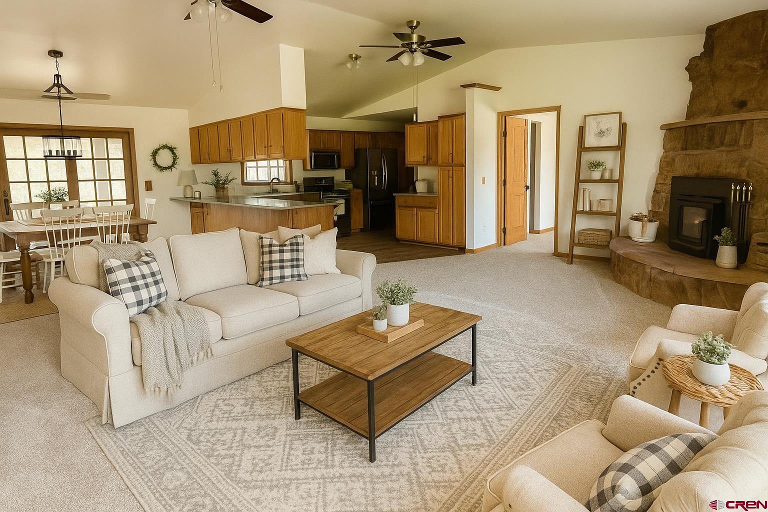 14894 Deer Run Road Delta, CO 81416 - Photo 5 of 40 a living room with furniture and a fireplace