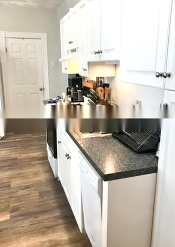 a kitchen with granite countertop a sink a stove and cabinets