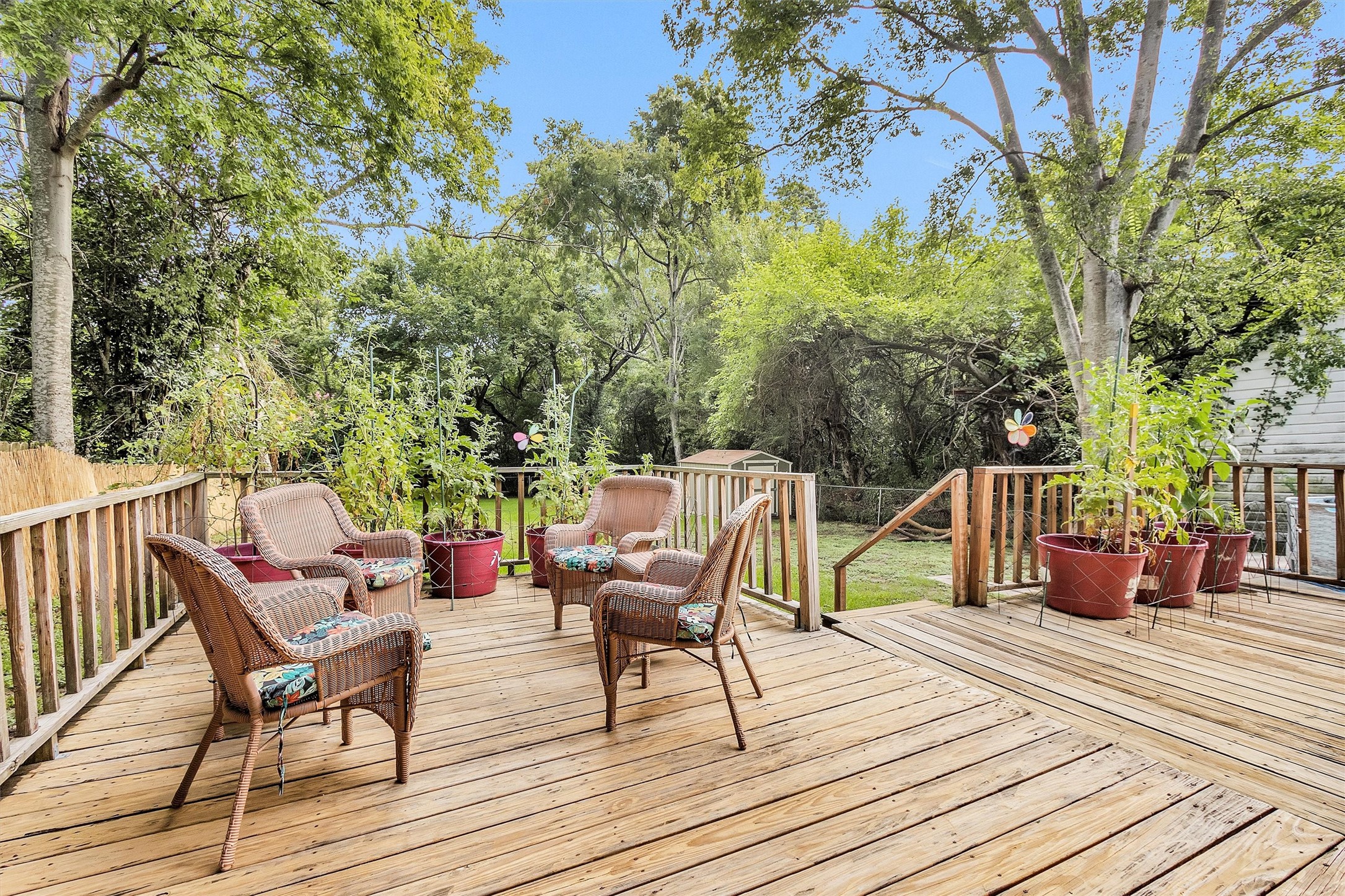 1720 18th Street Huntsville, TX 77340 - Photo 1 of 37 a view of deck with table and chairs and wooden floor