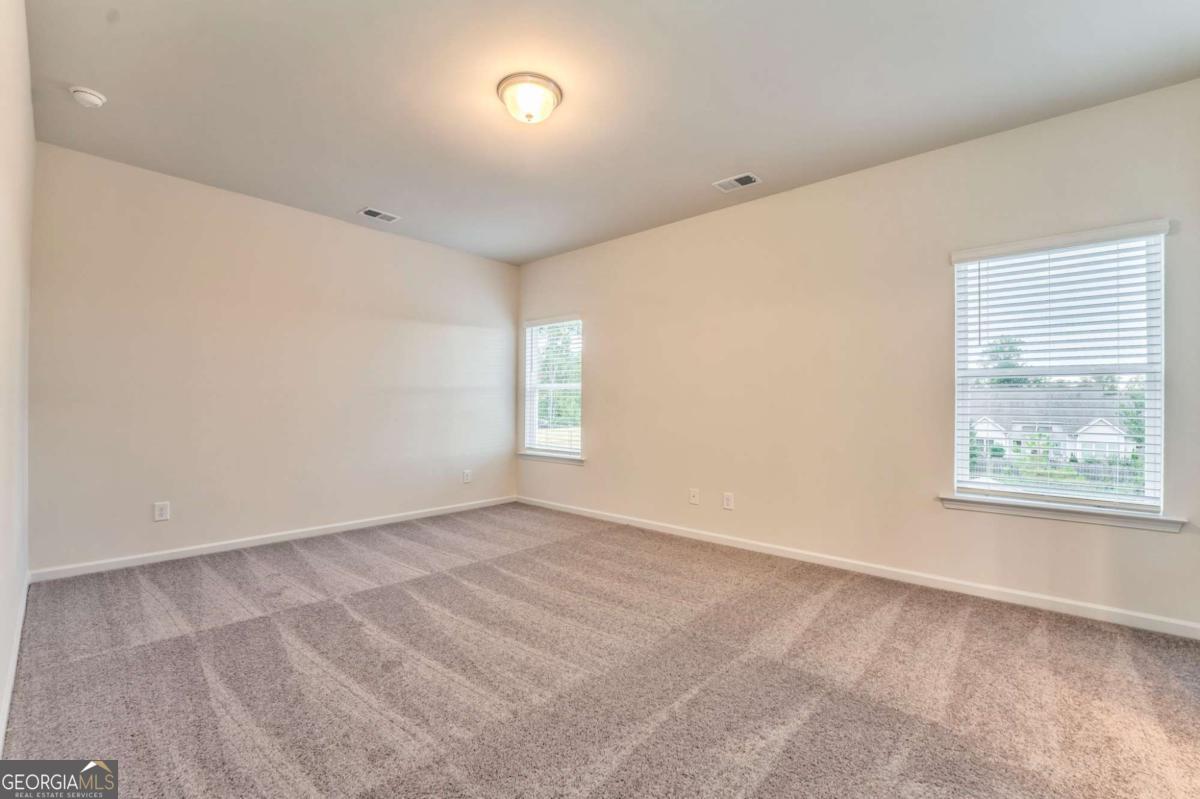8 Majestic Oaks Way Northeast Rome, GA 30165 - Photo 19 of 25 a view of an empty room with a window