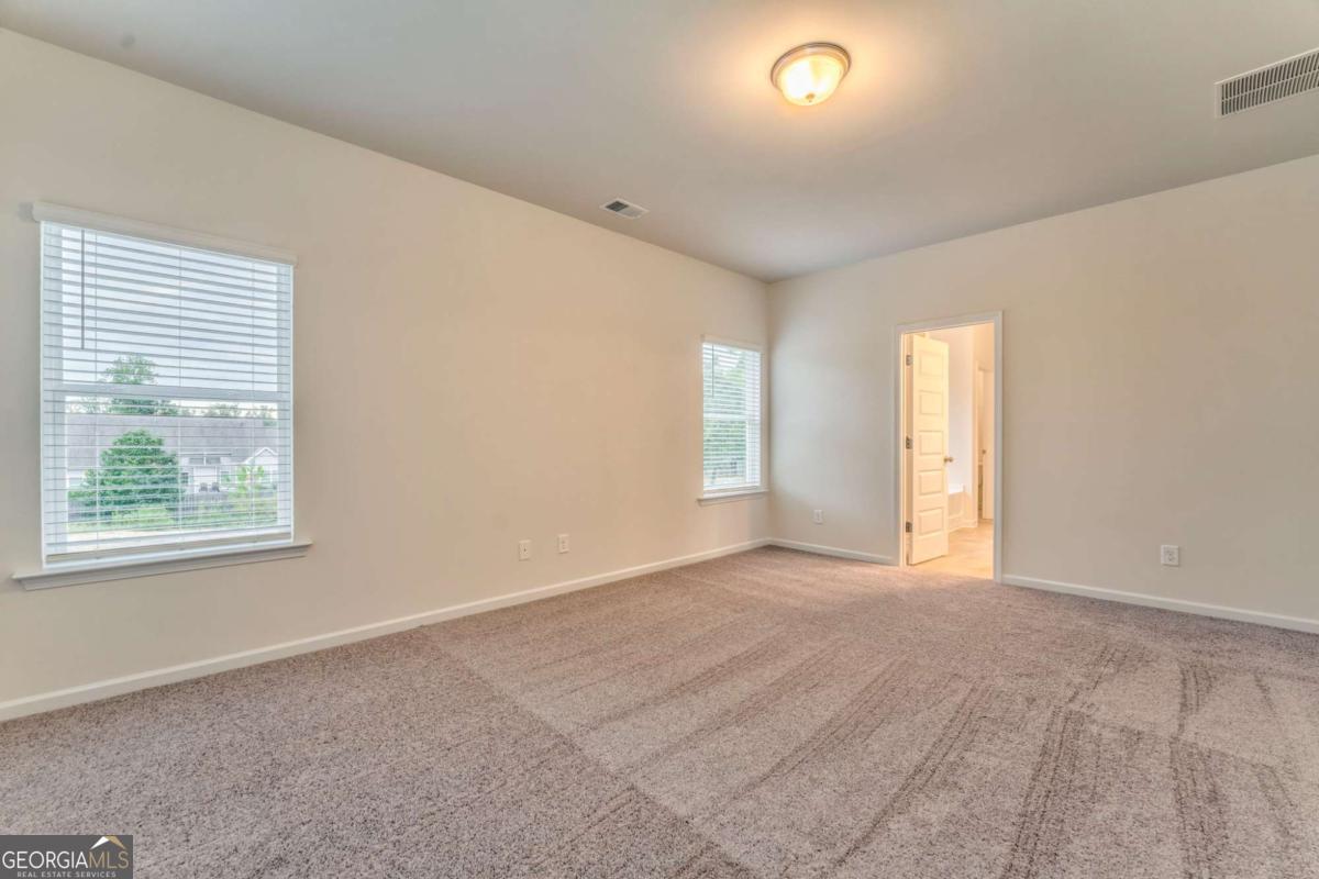 8 Majestic Oaks Way Northeast Rome, GA 30165 - Photo 20 of 25 a view of an empty room with a window