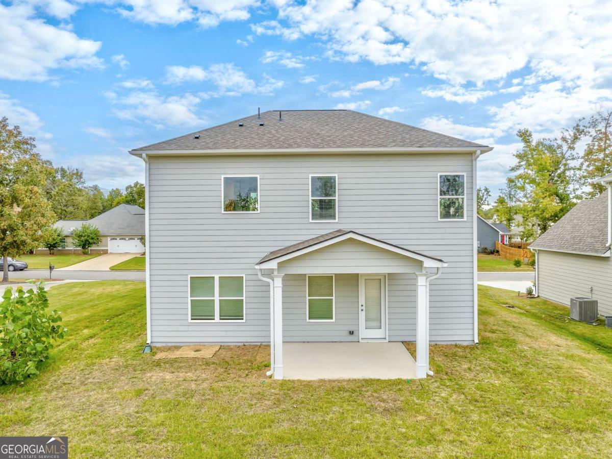 8 Majestic Oaks Way Northeast Rome, GA 30165 - Photo 24 of 25 a front view of a house with a yard