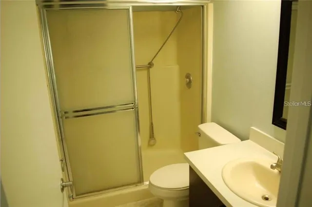 a bathroom with a sink and toilet