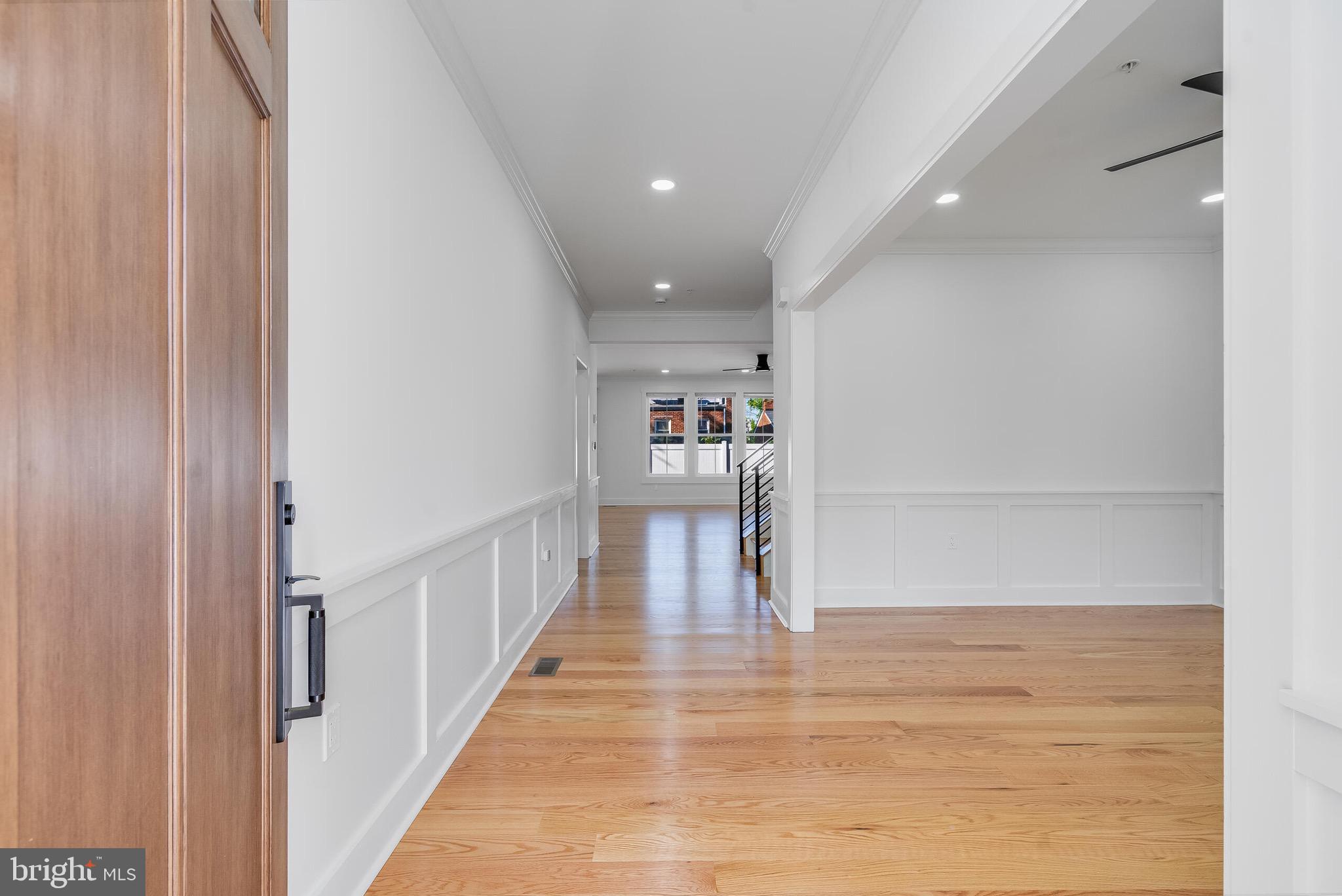 4626 Brooks Street Northeast Washington, DC 20019 - Photo 28 of 65 a view of a hallway with wooden floor