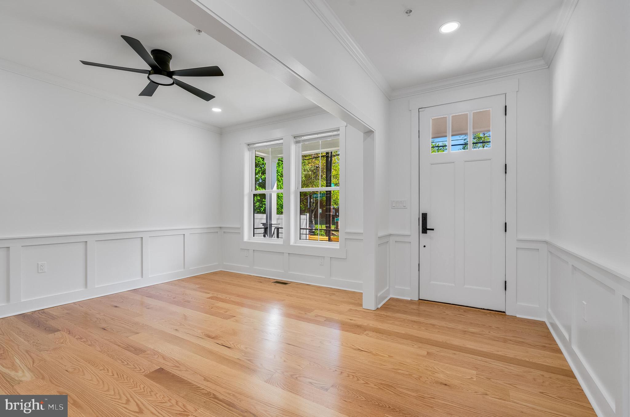4626 Brooks Street Northeast Washington, DC 20019 - Photo 29 of 65 a view of a livingroom with a ceiling fan and window