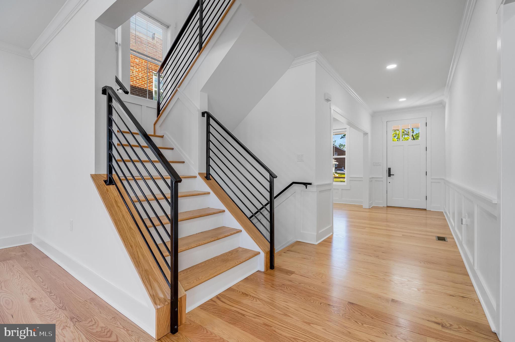 4626 Brooks Street Northeast Washington, DC 20019 - Photo 30 of 65 a view of an entryway with wooden floor and stairs