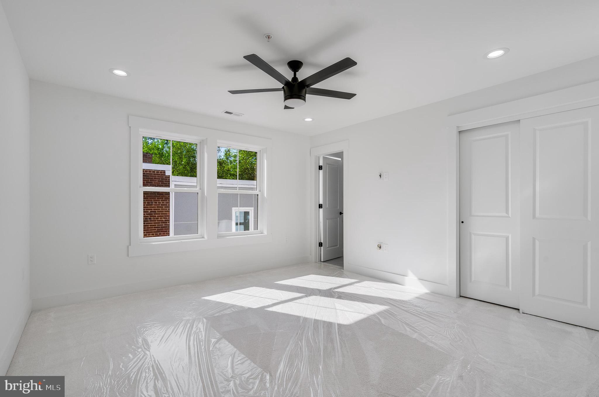 4626 Brooks Street Northeast Washington, DC 20019 - Photo 47 of 65 a view of a livingroom with a ceiling fan and window