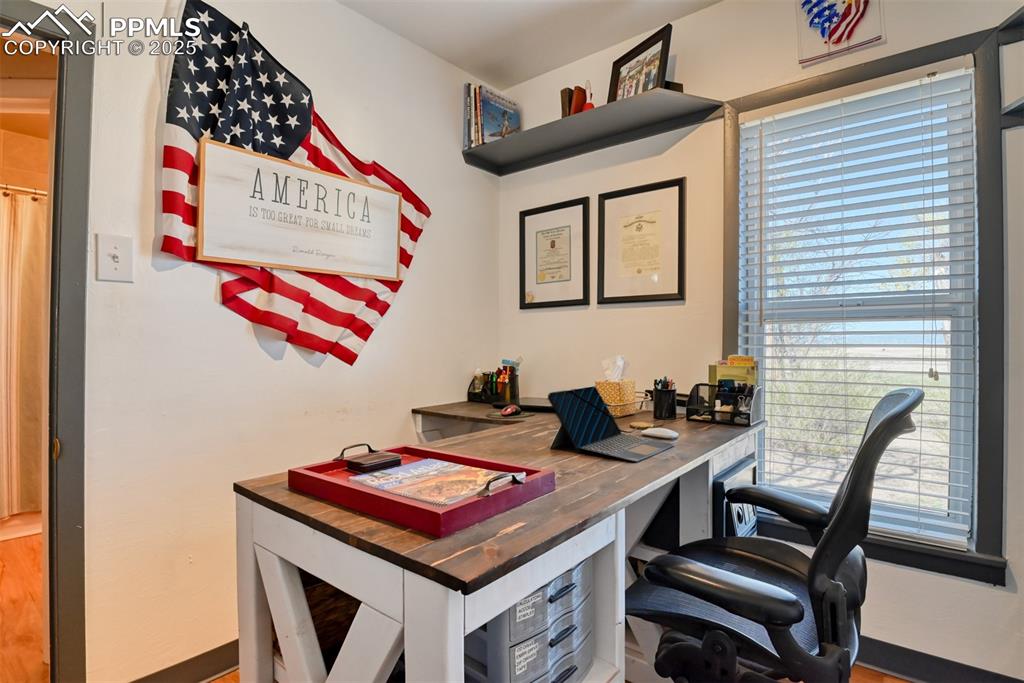 22500 Enoch Road Calhan, CO 80808 - Photo 8 of 39 a table that has a table and a chair