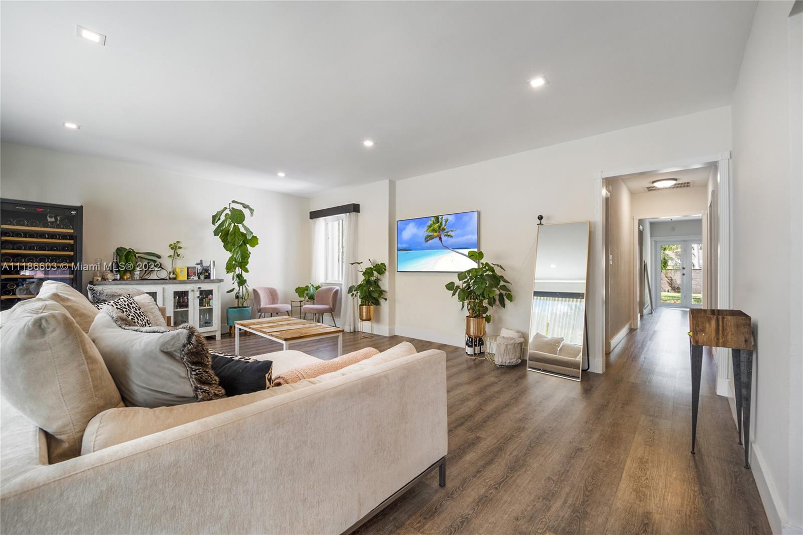 256 Southwest 30th Road Miami, FL 33129 - Photo 2 of 17 a living room with furniture and a wooden floor
