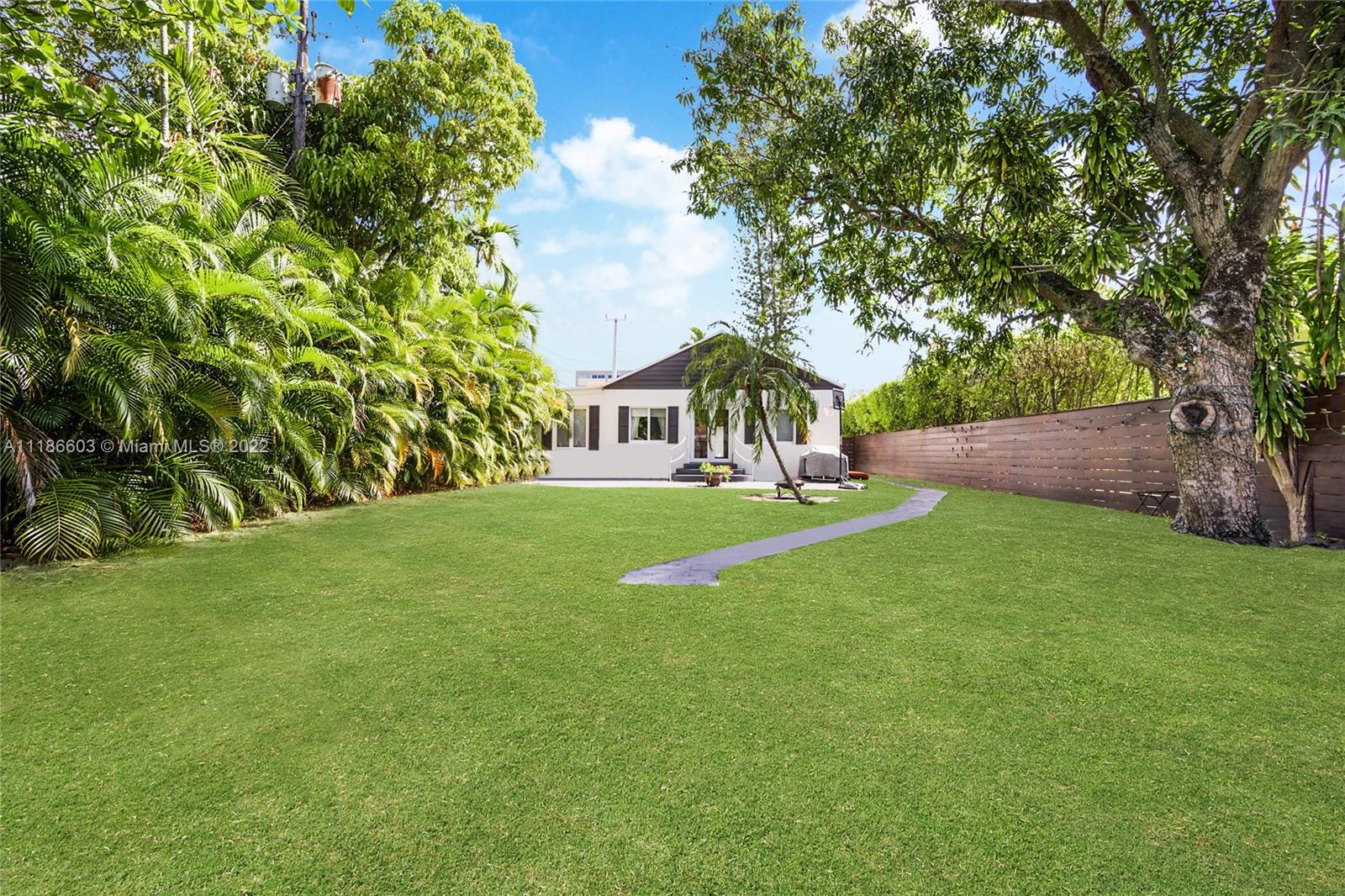 256 Southwest 30th Road Miami, FL 33129 - Photo 6 of 17 a view of green field