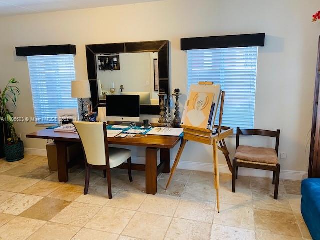 256 Southwest 30th Road Miami, FL 33129 - Photo 7 of 17 a outdoor dining space with furniture and chandelier