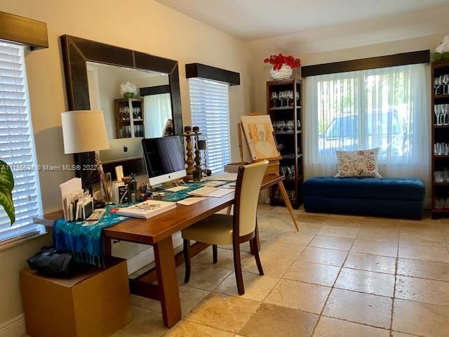 256 Southwest 30th Road Miami, FL 33129 - Photo 9 of 17 a view of a workspace with furniture and a window