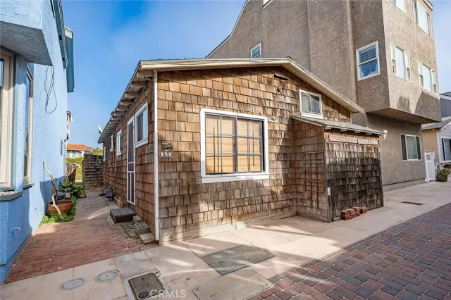 a front view of a house with glass windows