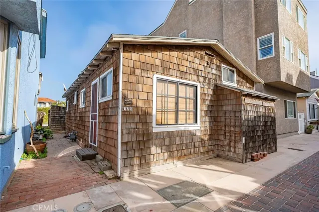 a view of roof deck with seating area and water view