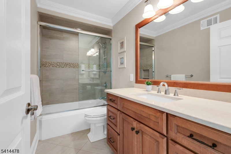 33 St Nickolas Way Bernards, NJ 07920 - Photo 27 of 50 a bathroom with a sink a toilet and shower