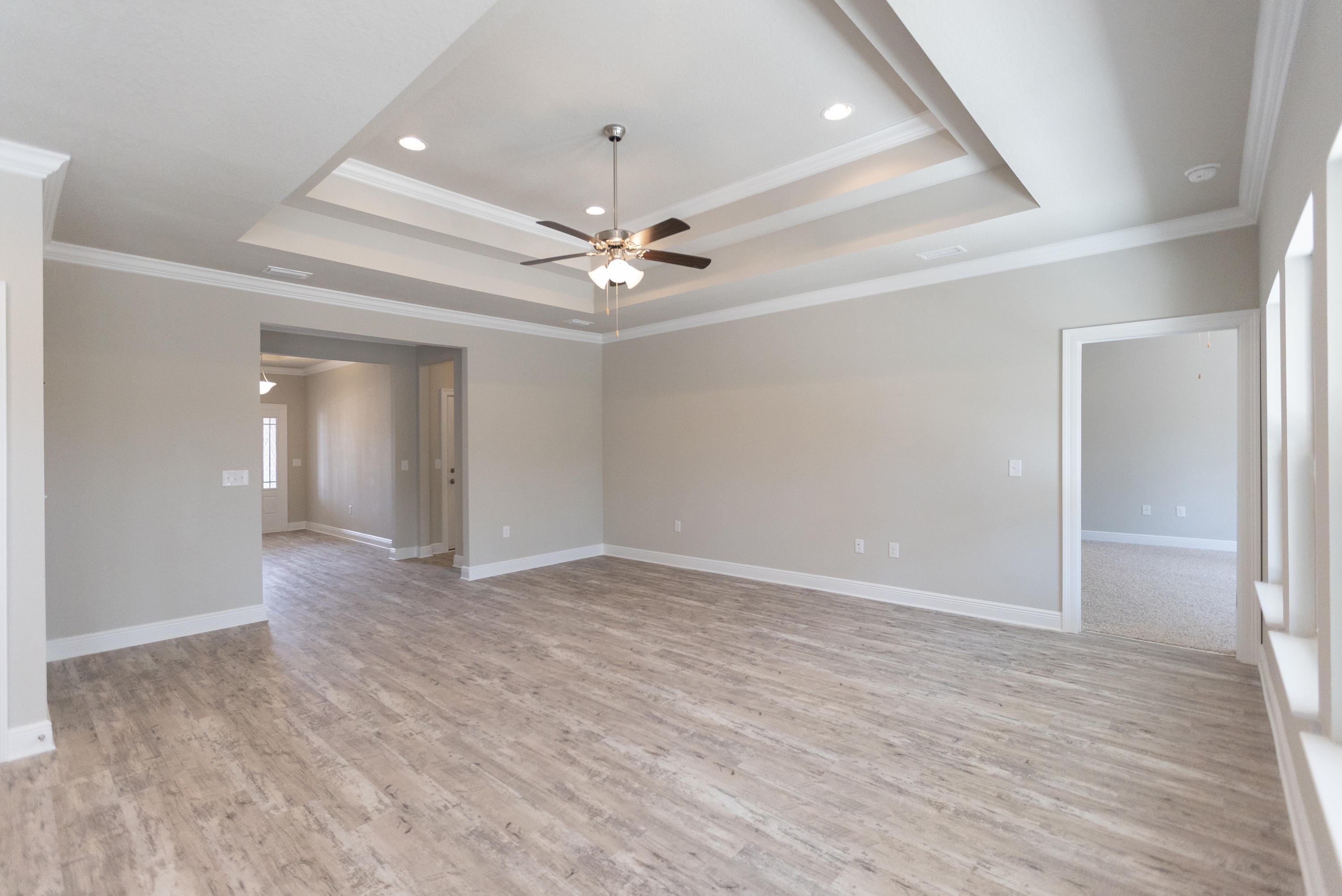 72 Conner Circle Santa Rosa Beach, FL 32459 - Photo 3 of 42 an empty room with fan and a ceiling fan