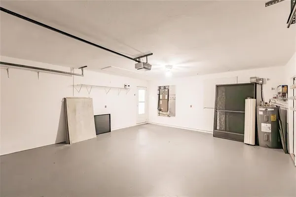 a view of a garage with refrigerator