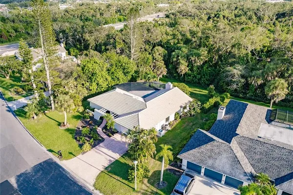 an aerial view of a house with a garden
