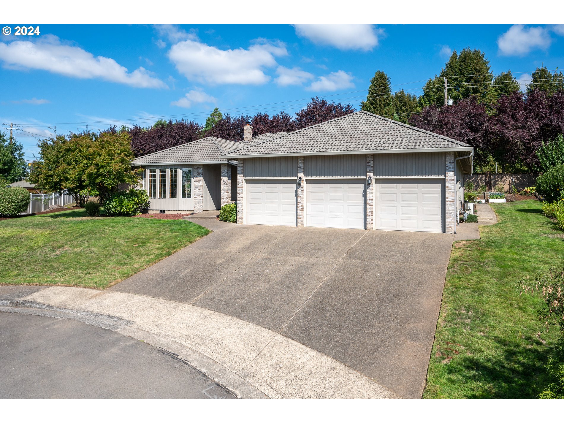 1908 Northwest 140th Circle Vancouver, WA 98685 - Photo 1 of 46 a house view with a garden space