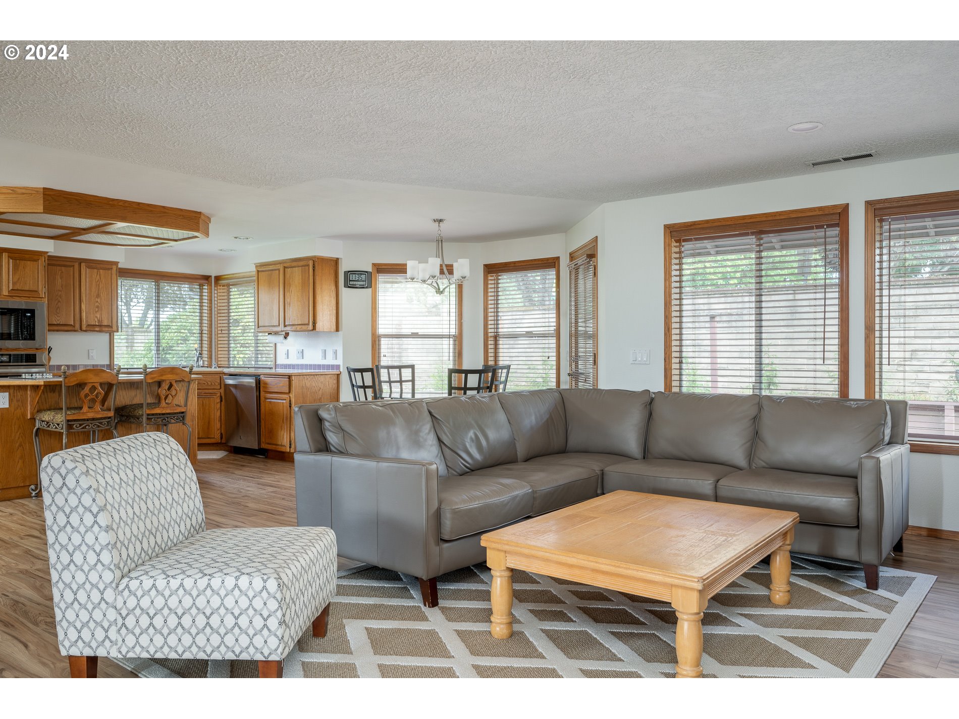 1908 Northwest 140th Circle Vancouver, WA 98685 - Photo 12 of 46 a living room with furniture potted plant and a window