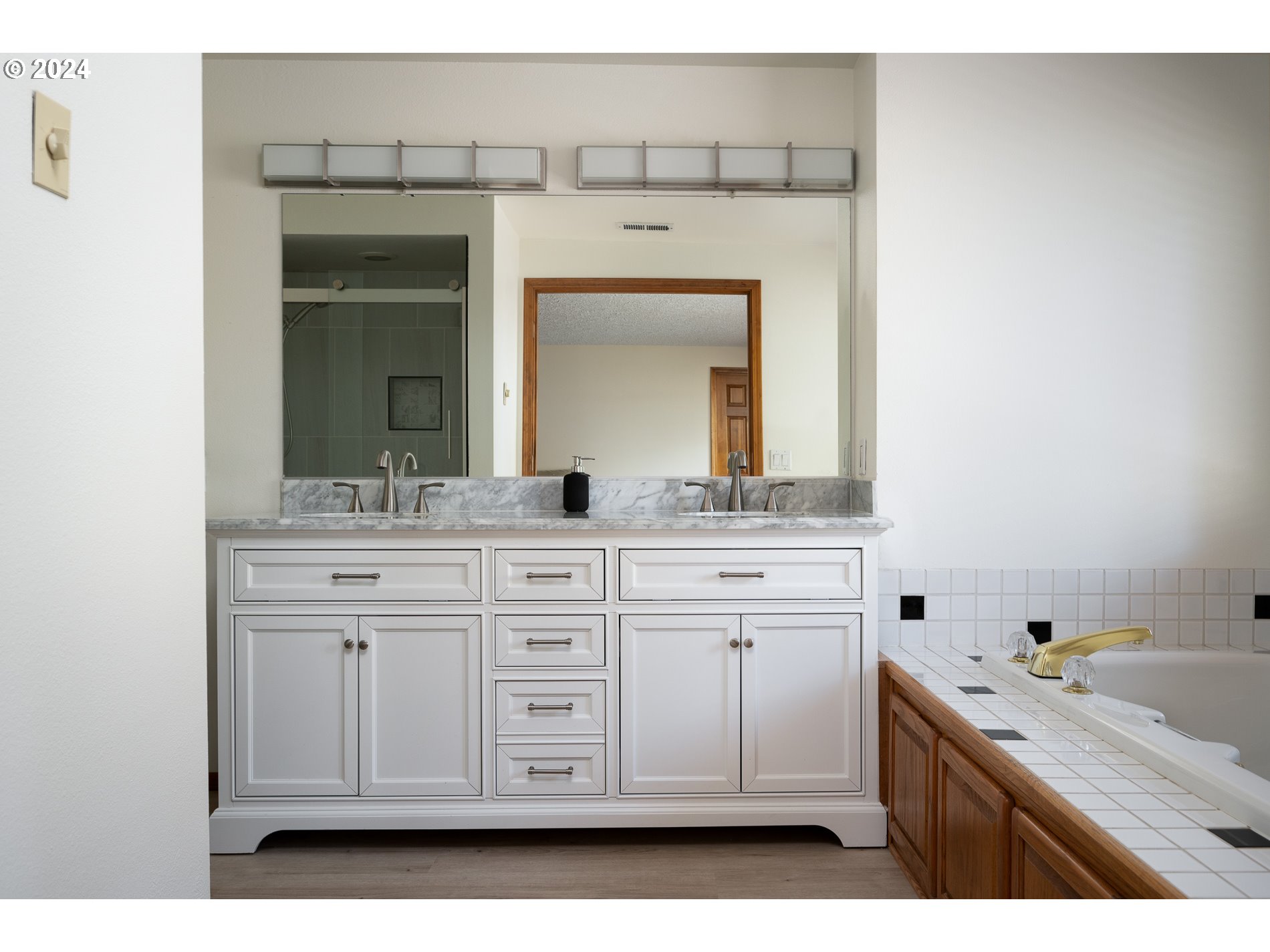 1908 Northwest 140th Circle Vancouver, WA 98685 - Photo 22 of 46 a bathroom with a sink and a mirror