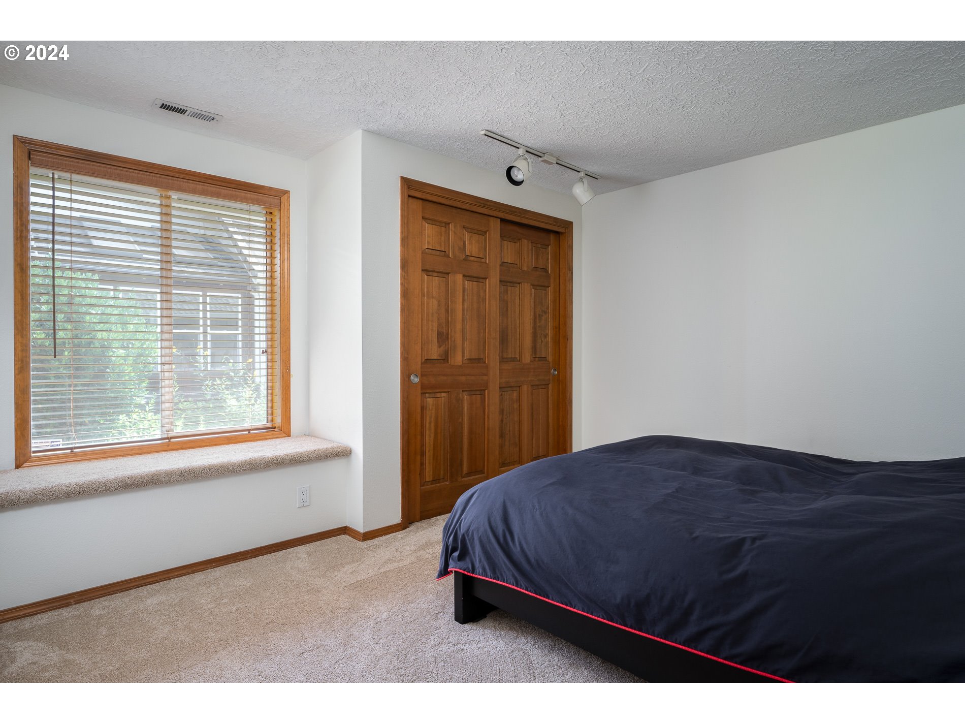 1908 Northwest 140th Circle Vancouver, WA 98685 - Photo 27 of 46 a bedroom with a bed and a window