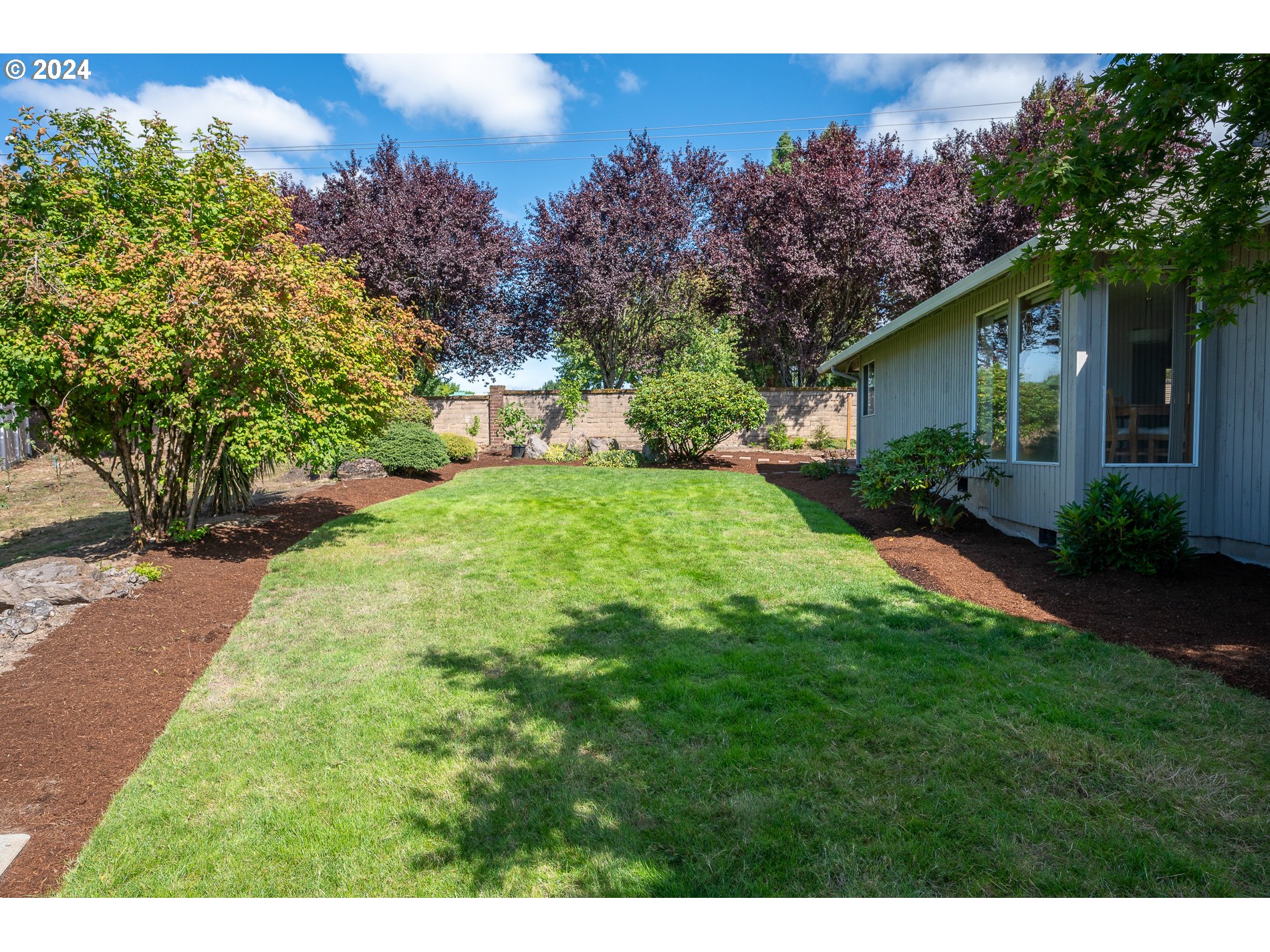 1908 Northwest 140th Circle Vancouver, WA 98685 - Photo 31 of 46 a view of a backyard with a garden