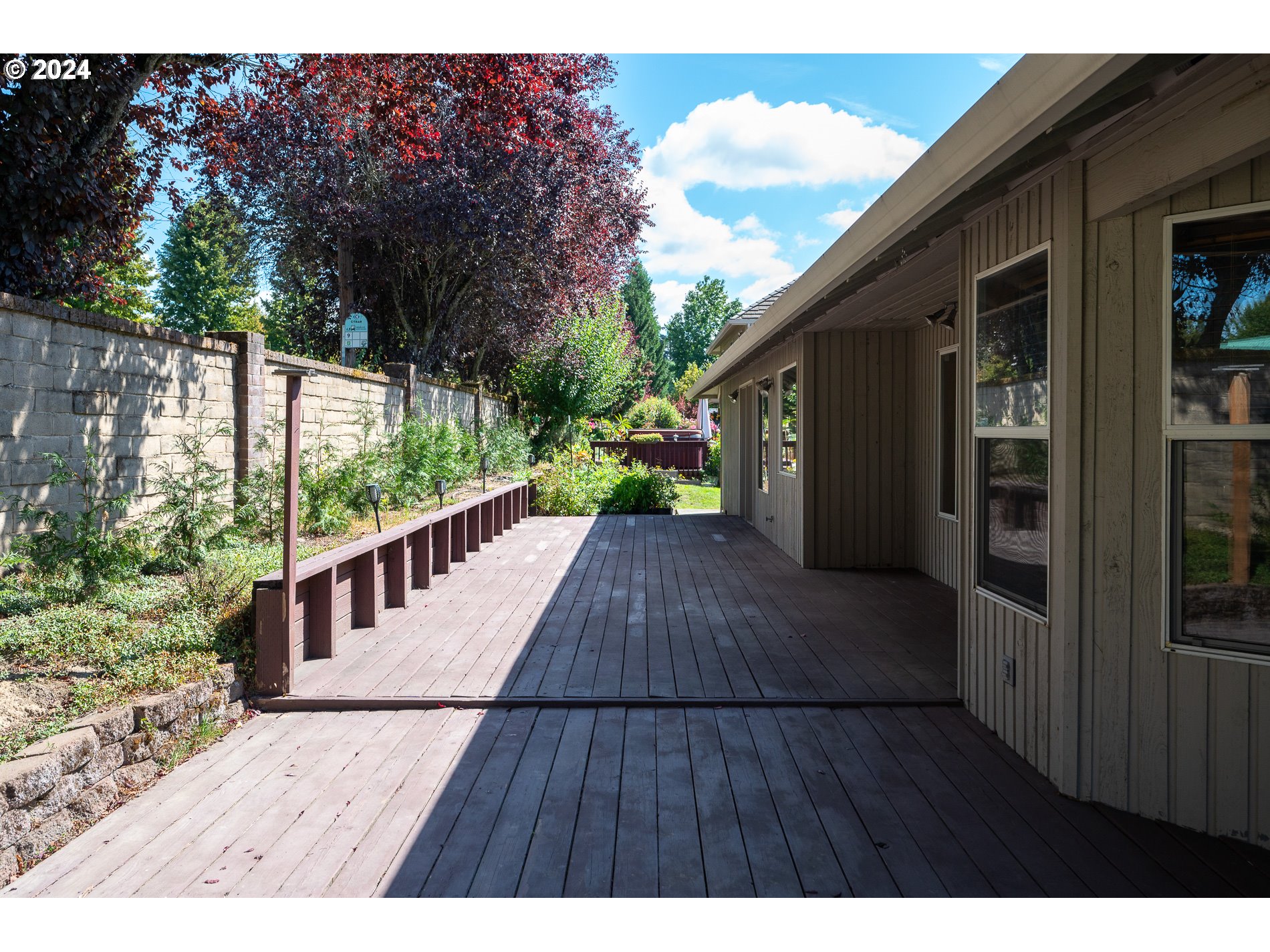 1908 Northwest 140th Circle Vancouver, WA 98685 - Photo 35 of 46 a view of backyard with a deck and wooden floor