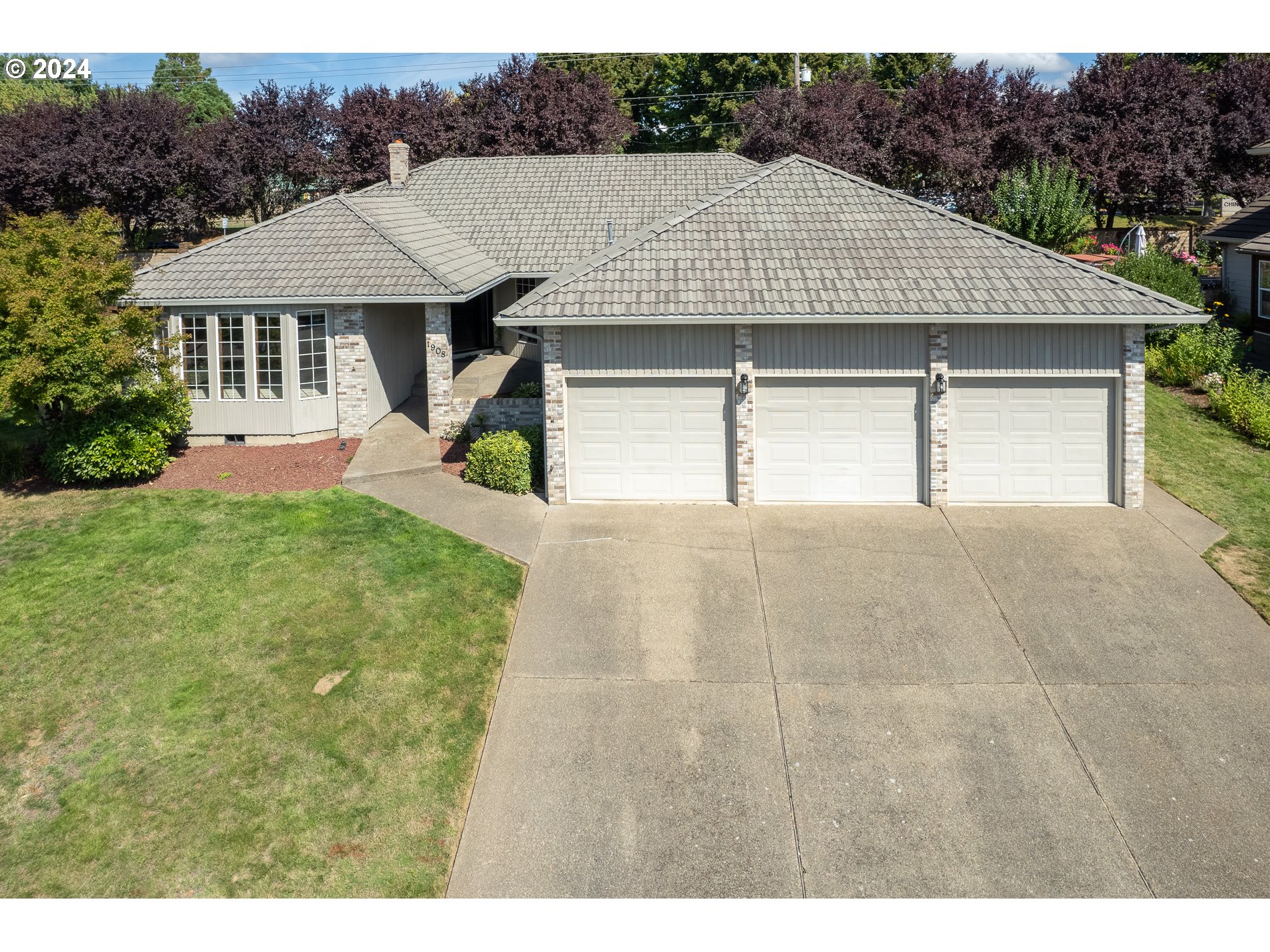 1908 Northwest 140th Circle Vancouver, WA 98685 - Photo 4 of 46 a aerial view of a house with yard and plants