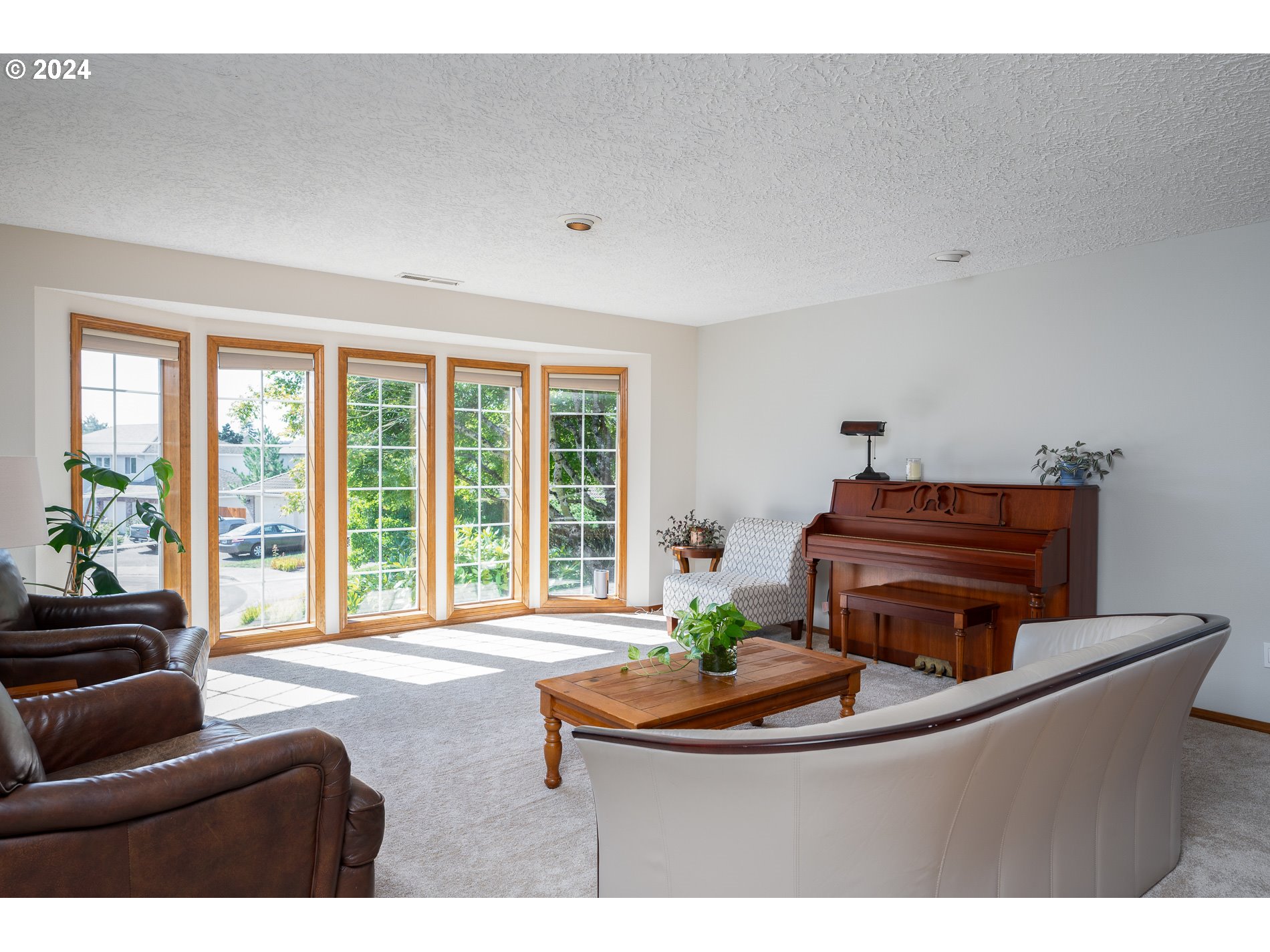 1908 Northwest 140th Circle Vancouver, WA 98685 - Photo 8 of 46 a living room with furniture and large windows