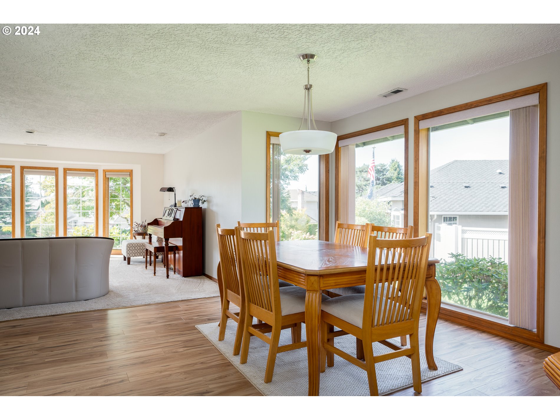 1908 Northwest 140th Circle Vancouver, WA 98685 - Photo 9 of 46 a view of a dining room with furniture and wooden floor