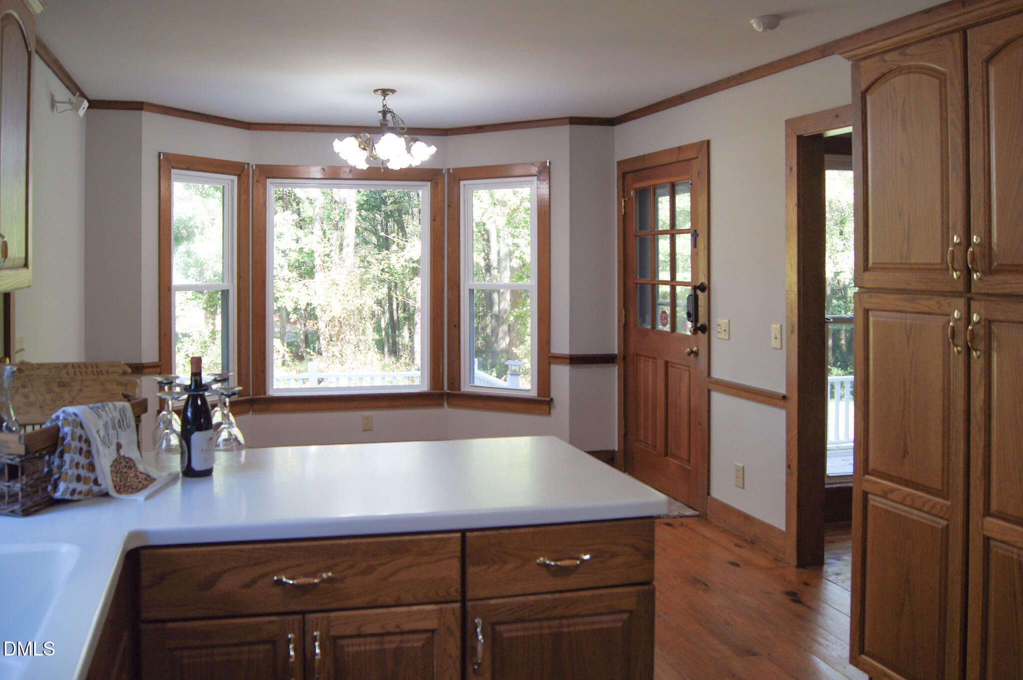 8720 Mt Pleasant Church Road Willow Spring, NC 27592 - Photo 16 of 77 a bathroom with a sink a large mirror and a bathtub