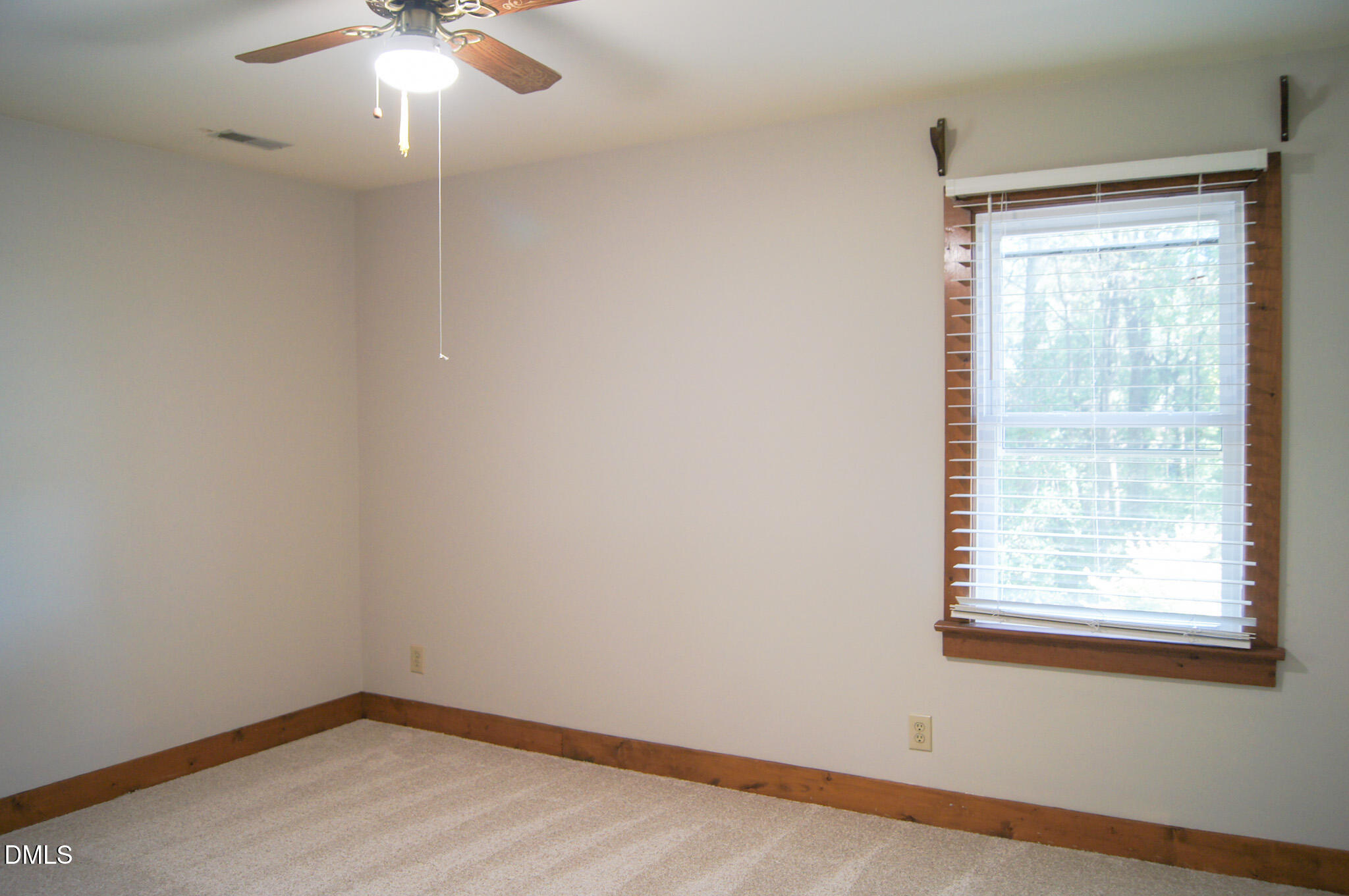 8720 Mt Pleasant Church Road Willow Spring, NC 27592 - Photo 36 of 77 an empty room with a window