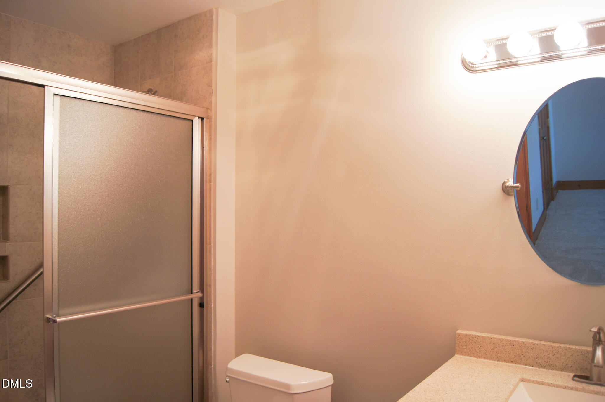 8720 Mt Pleasant Church Road Willow Spring, NC 27592 - Photo 41 of 77 a white toilet sitting next to a shower