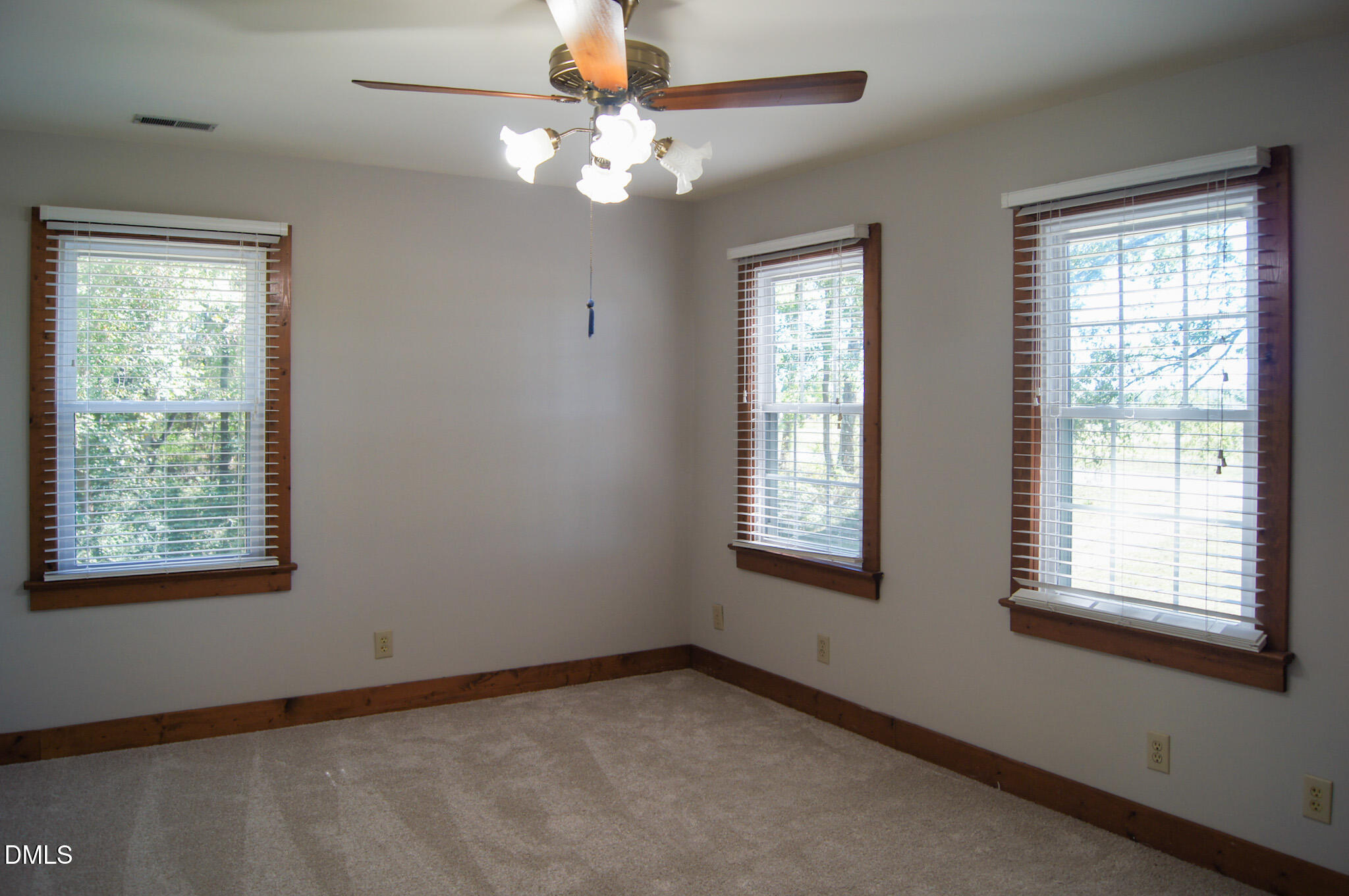 8720 Mt Pleasant Church Road Willow Spring, NC 27592 - Photo 44 of 77 a view of an empty room with a window