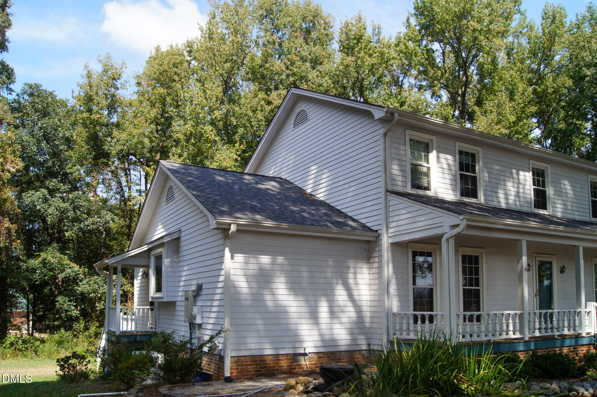 8720 Mt Pleasant Church Road Willow Spring, NC 27592 - Photo 73 of 77 a house that has a tree in front of the house