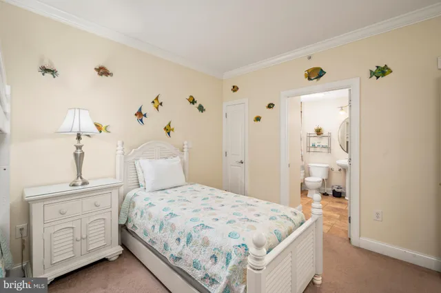 a bedroom with a bed and a cabinets