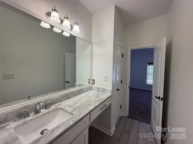 a white bath tub with a shower