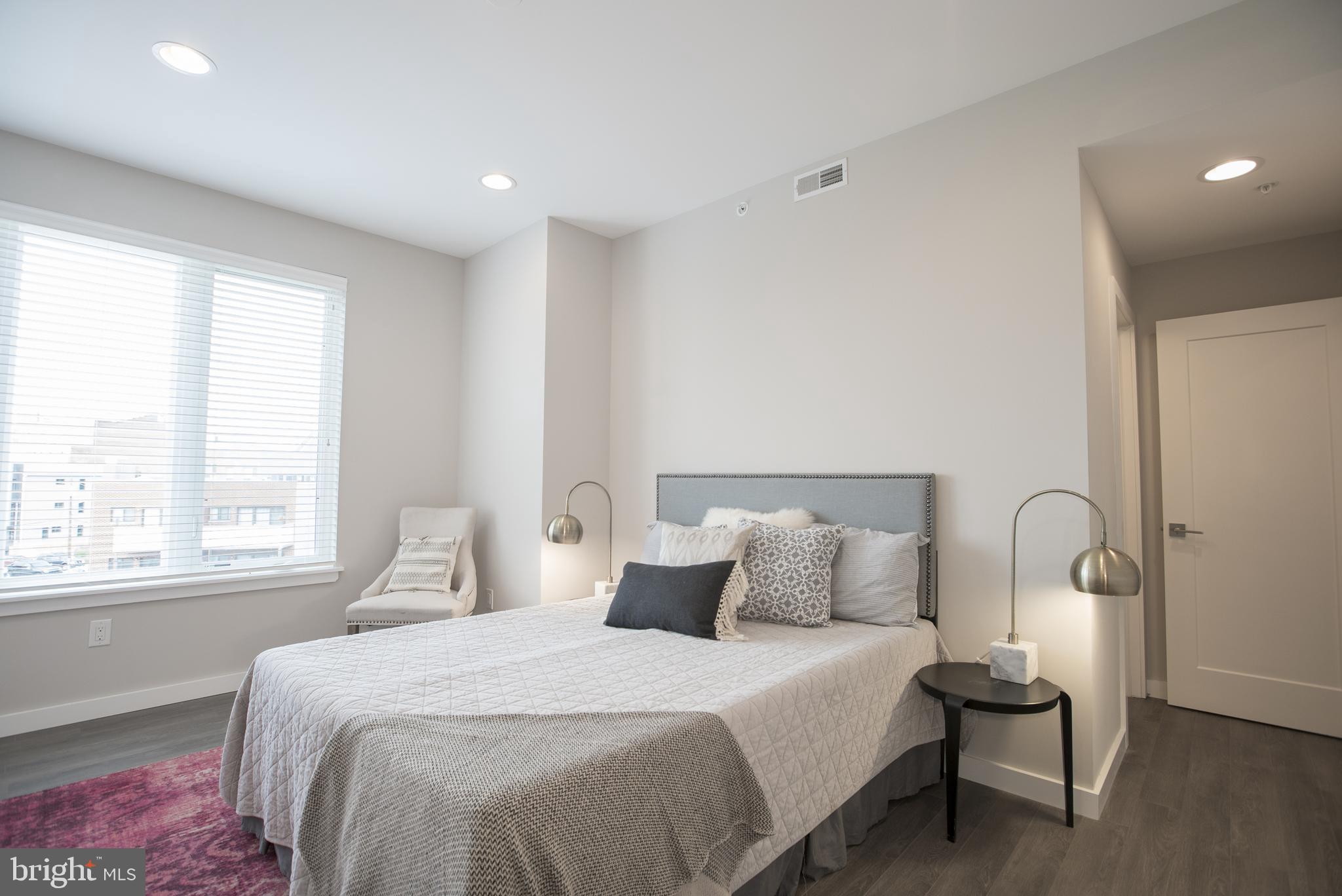 1508 Ridge Avenue, Unit 501 Philadelphia, PA 19130 - Photo 13 of 19 a bedroom with a bed and a window