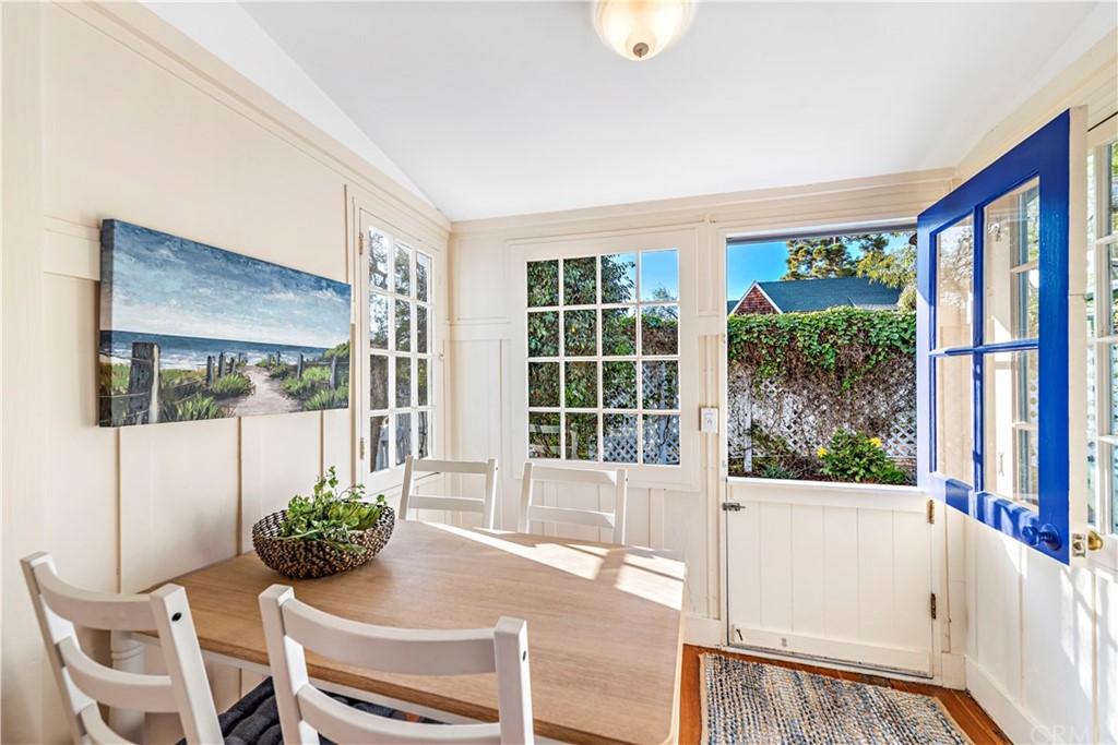 429 Hawthorne Road Laguna Beach, CA 92651 - Photo 12 of 33 a view of a room that has a bed and glass windows