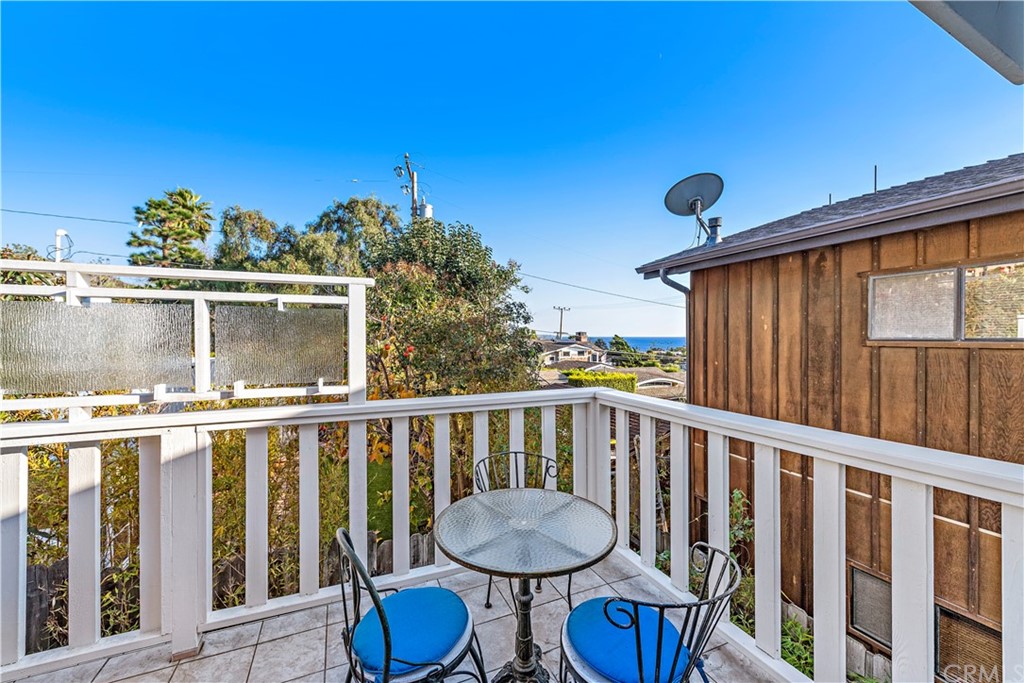 429 Hawthorne Road Laguna Beach, CA 92651 - Photo 14 of 33 a view of a chair and table in the balcony