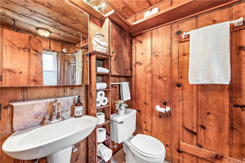 429 Hawthorne Road Laguna Beach, CA 92651 - Photo 24 of 33 a bathroom with a sink toilet and shower