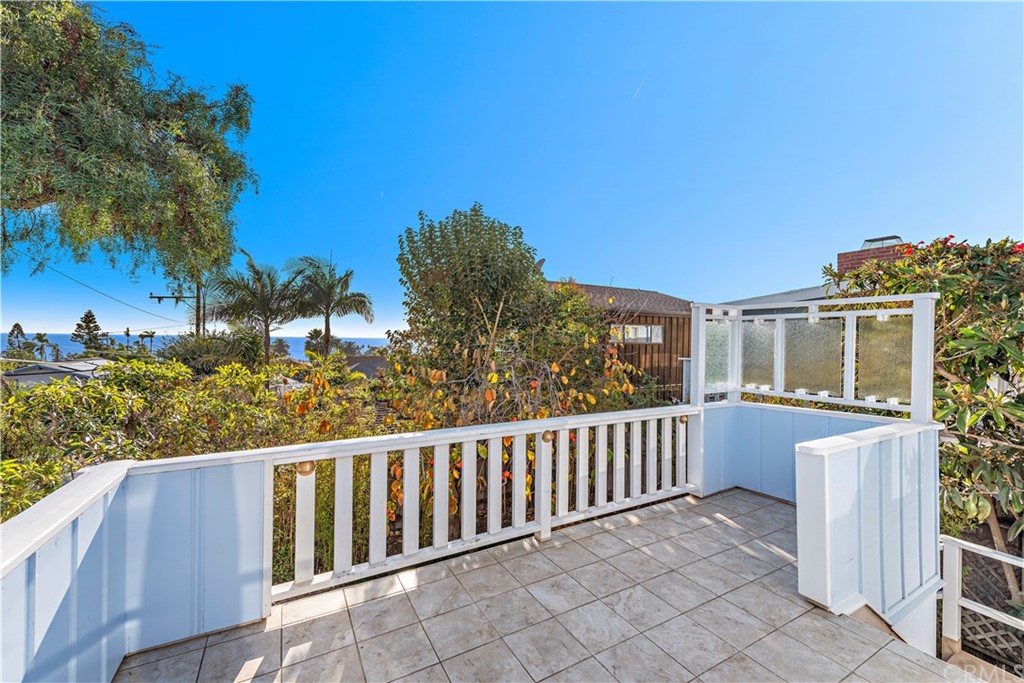 429 Hawthorne Road Laguna Beach, CA 92651 - Photo 25 of 33 a view of a balcony with wooden fence