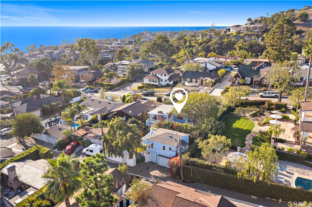429 Hawthorne Road Laguna Beach, CA 92651 - Photo 32 of 33 an aerial view of a city with lots of residential buildings and ocean view in back