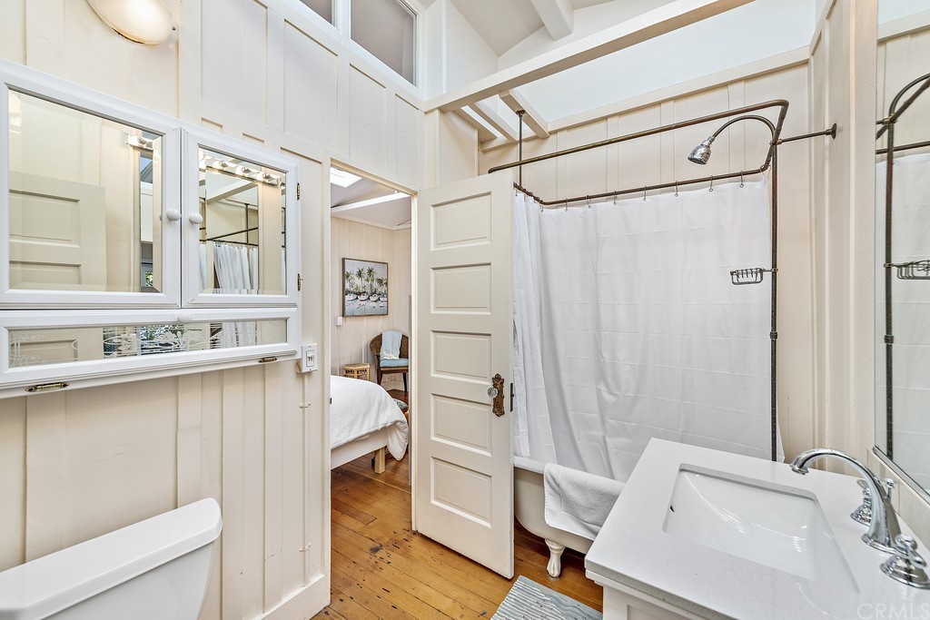 429 Hawthorne Road Laguna Beach, CA 92651 - Photo 9 of 33 a bathroom with a sink and a tub