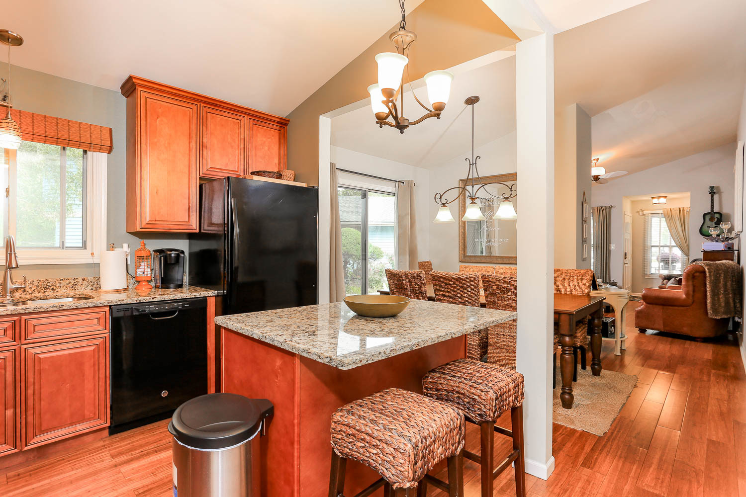 1517 Lighthouse Drive Naperville, IL 60565 - Photo 6 of 14 a kitchen with a table chairs stove and refrigerator